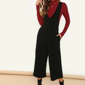 Black sleeveless jumpsuit